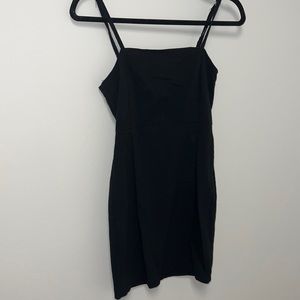 Tight mini black dress